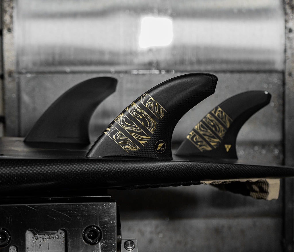 Futures Alpha 3/2 Carbon Tri Fin Set-Black/Gold-Medium — REAL