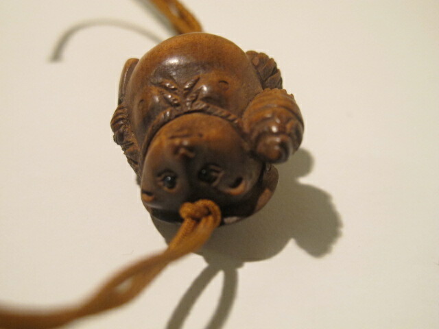 楽天市場】木彫り 根付 ストラップ〜たぬき〜一刀彫／材料：柘植