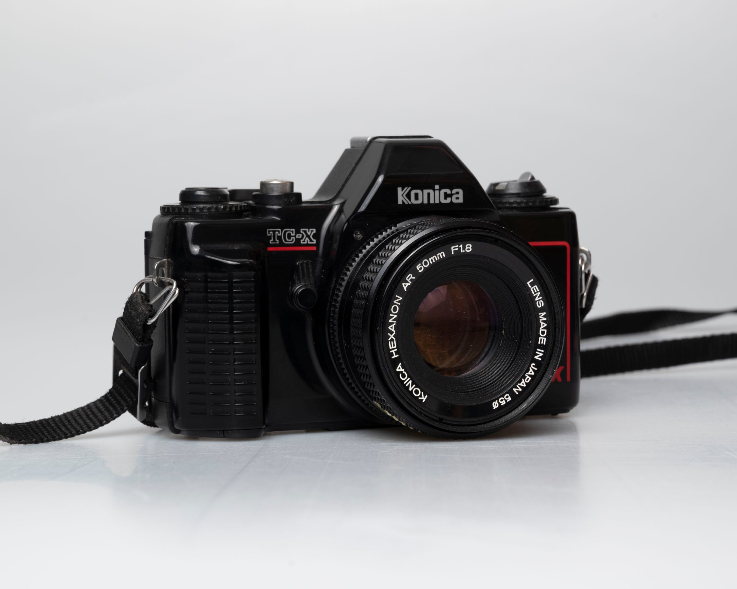 Konica TC-X 35mm film SLR w/ Hexanon AR 50mm f1.8 lens + manual