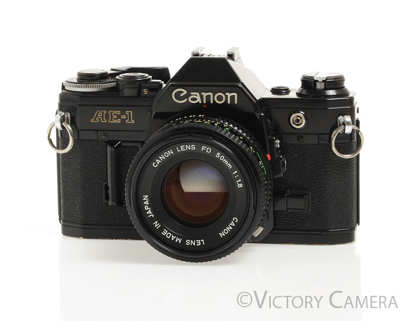 Canon AE-1 35mm Black Film Camera with 50mm f1.8 Lens -New Seals- [EXC