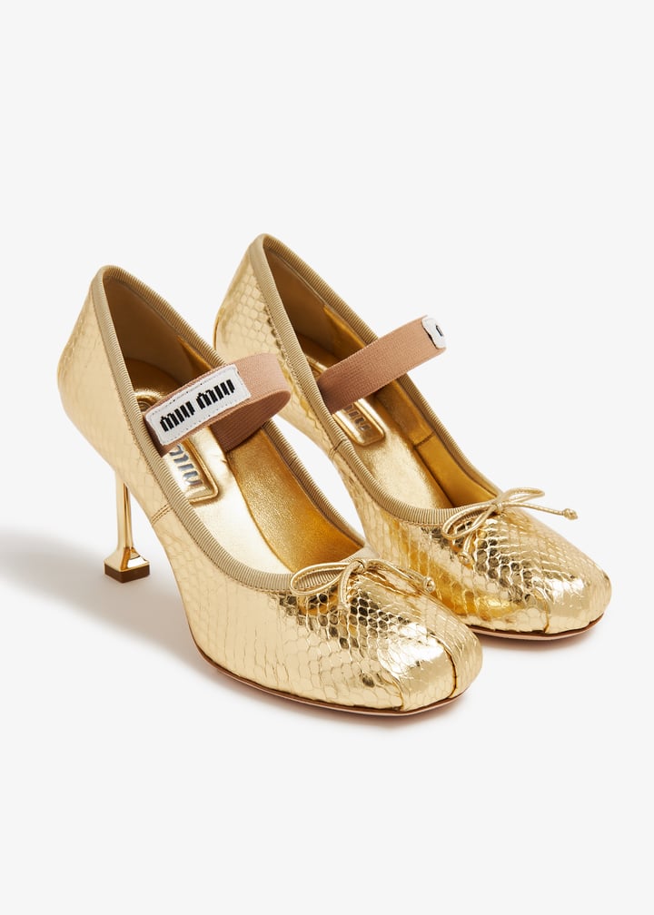 Miu Miu Ayers leather pumps for Women - Gold in UAE | Level Shoes