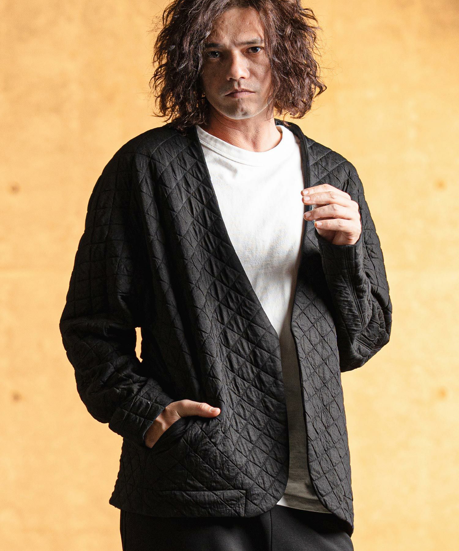 GLIMCLAP(グリムクラップ)】 Quilted fabric collarless jacket