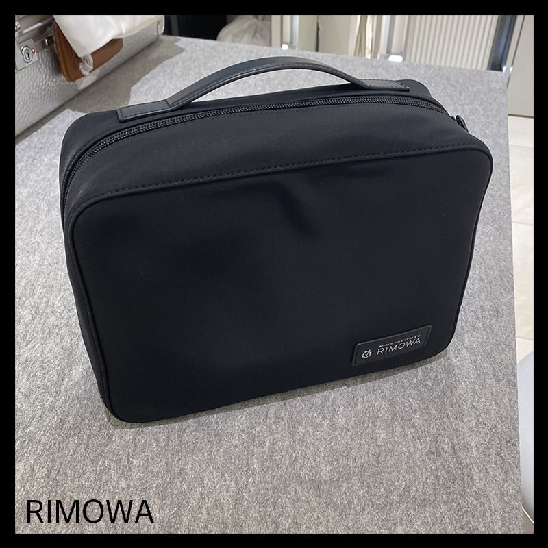 すぐ届く】 RIMWOA リモワ 三つ折り トイレタリー ポーチ (RIMOWA