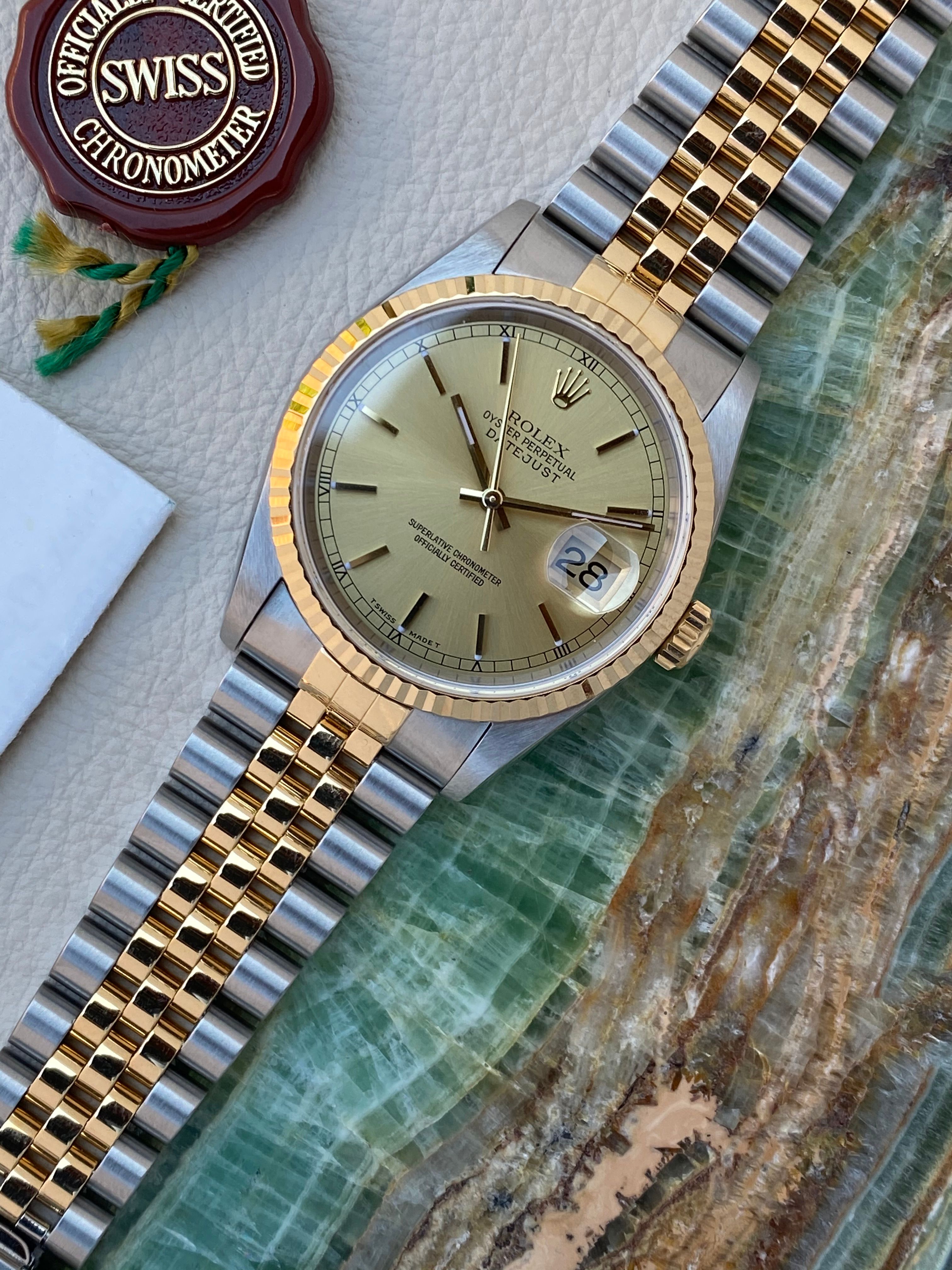 Rolex Datejust Gold Dial 16233 1999 with original box and papers