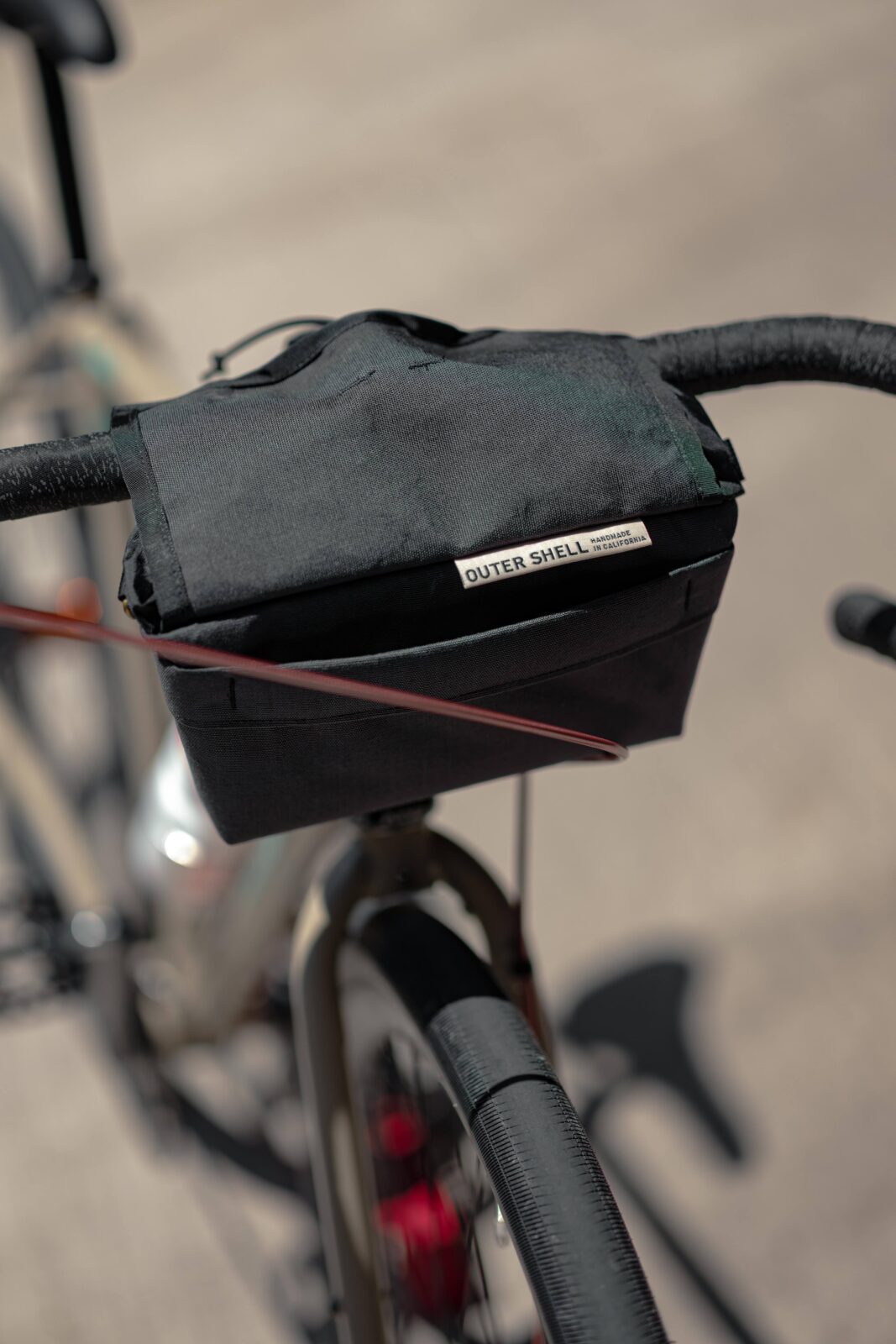OUTERSHELL ADVENTURE】新機能搭載！Drawcord Handlebar Bag – 2024