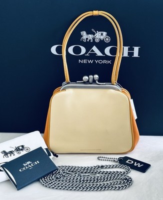 NWT COACH 1941 PALE YELLOW REXY KISSLOCK FRAME SATCHEL NICKEL