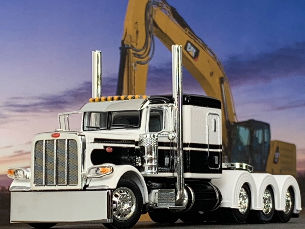 1/64 DCP WHITE/BLACK PETERBILT 389 TRI AXLE W/ 63