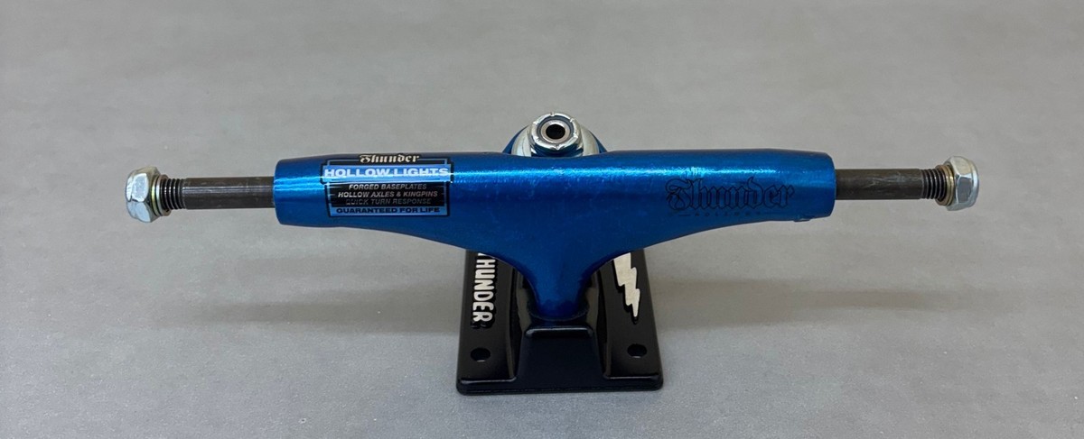 Thunder Trucks 147 Hollow Metallic Script Anodized Blue Trucks