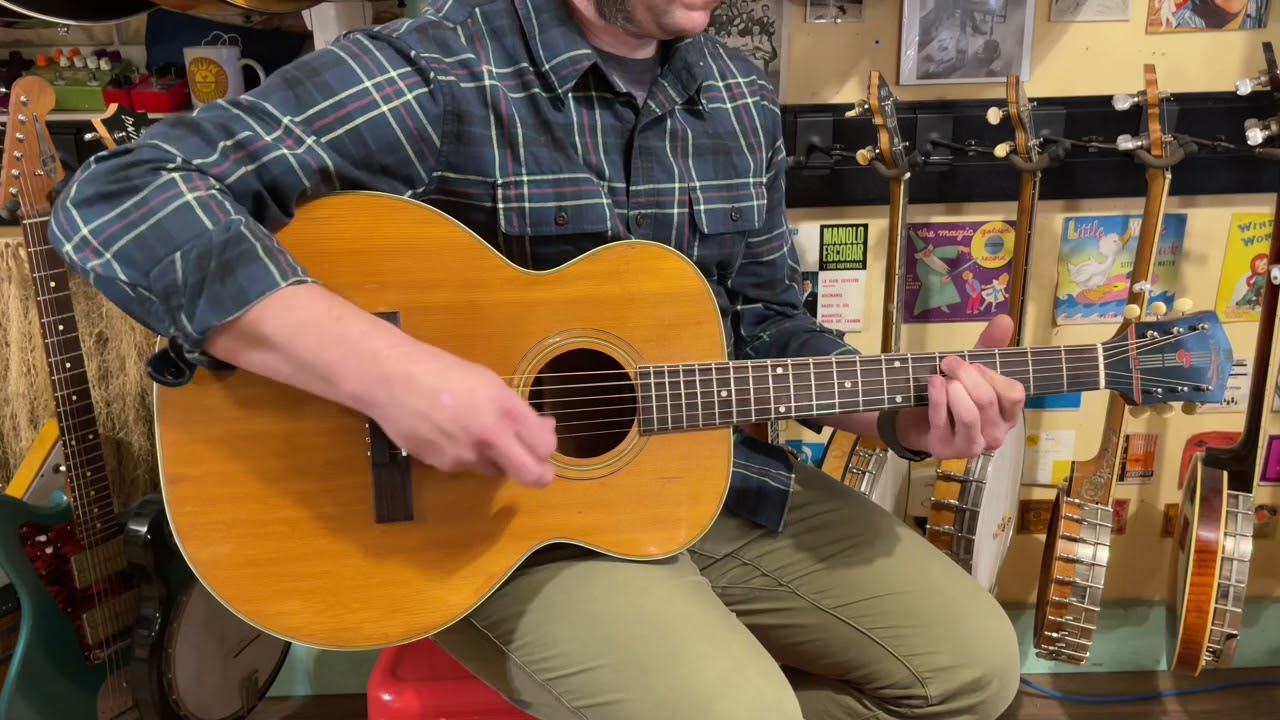 1940s SS Stewart (Harmony H1203) “figure 8” mini-jumbo guitar