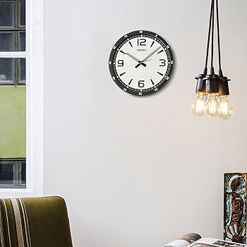 Amazon.com: SEIKO QXM362BRH 18 Melodies in Motion Rotating