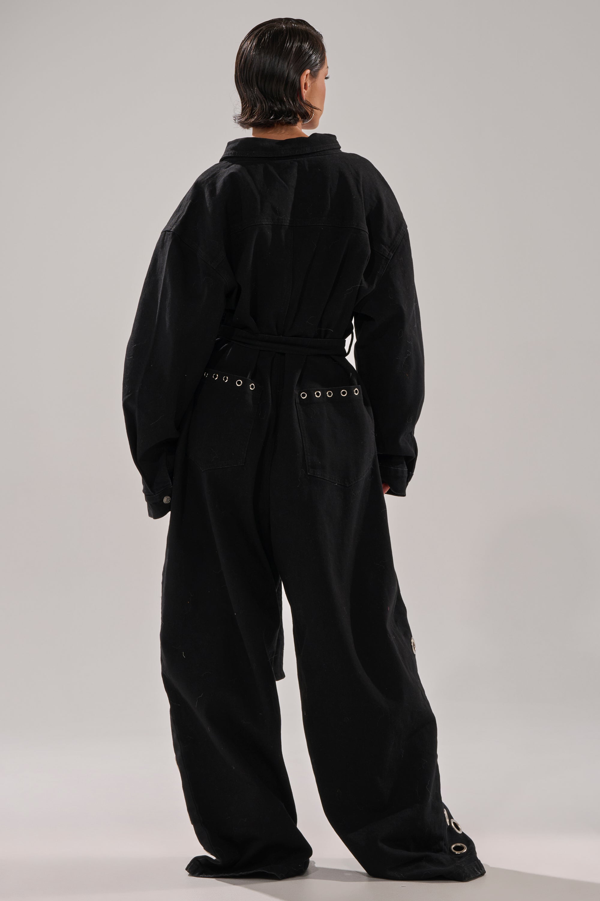 PLAY YOUR CARDS RIGHT DENIM JUMPSUIT WITH GROMMETS – AKIRA