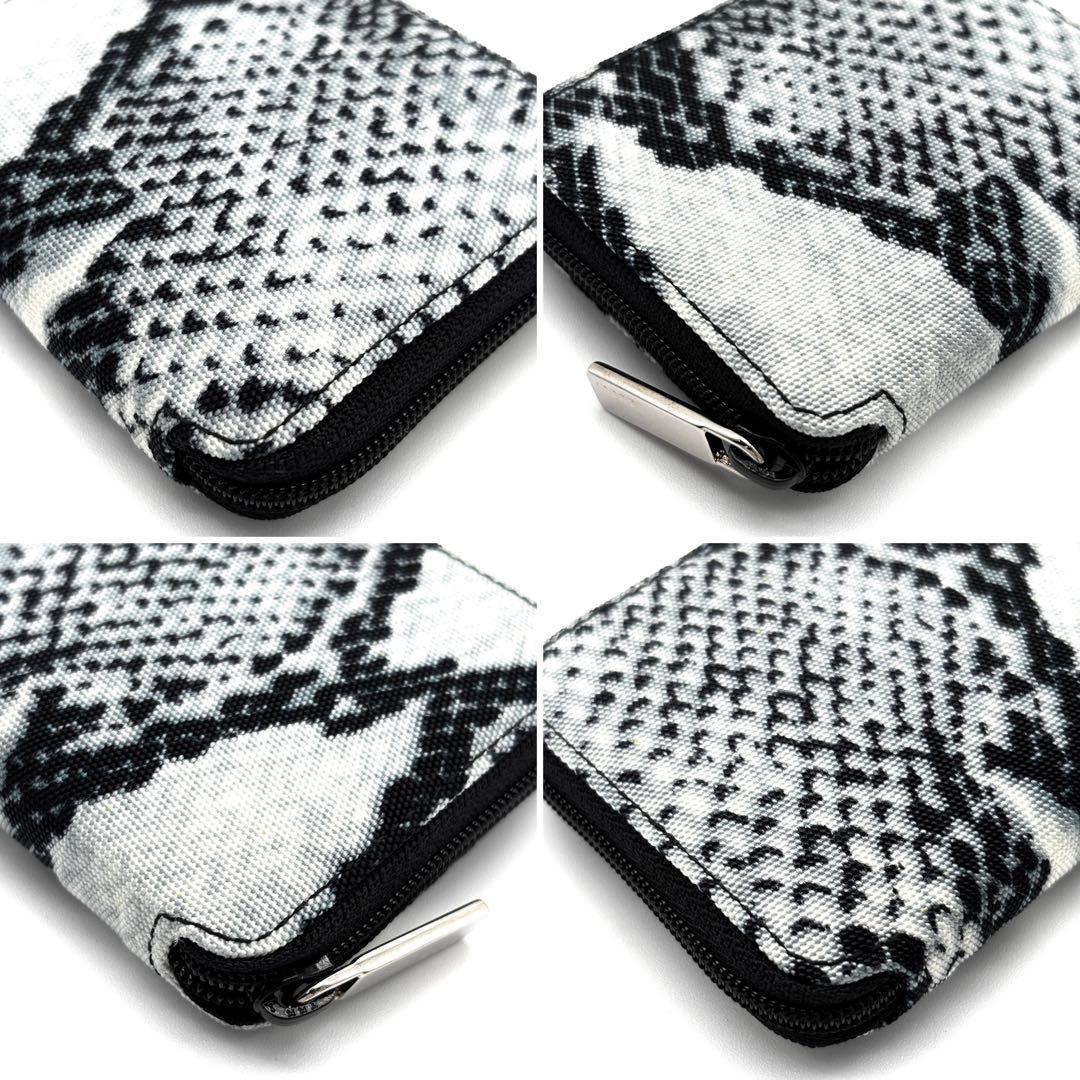 未使用保管品 グッチ コインケース パイソン柄 ラウンドジップ ブルー