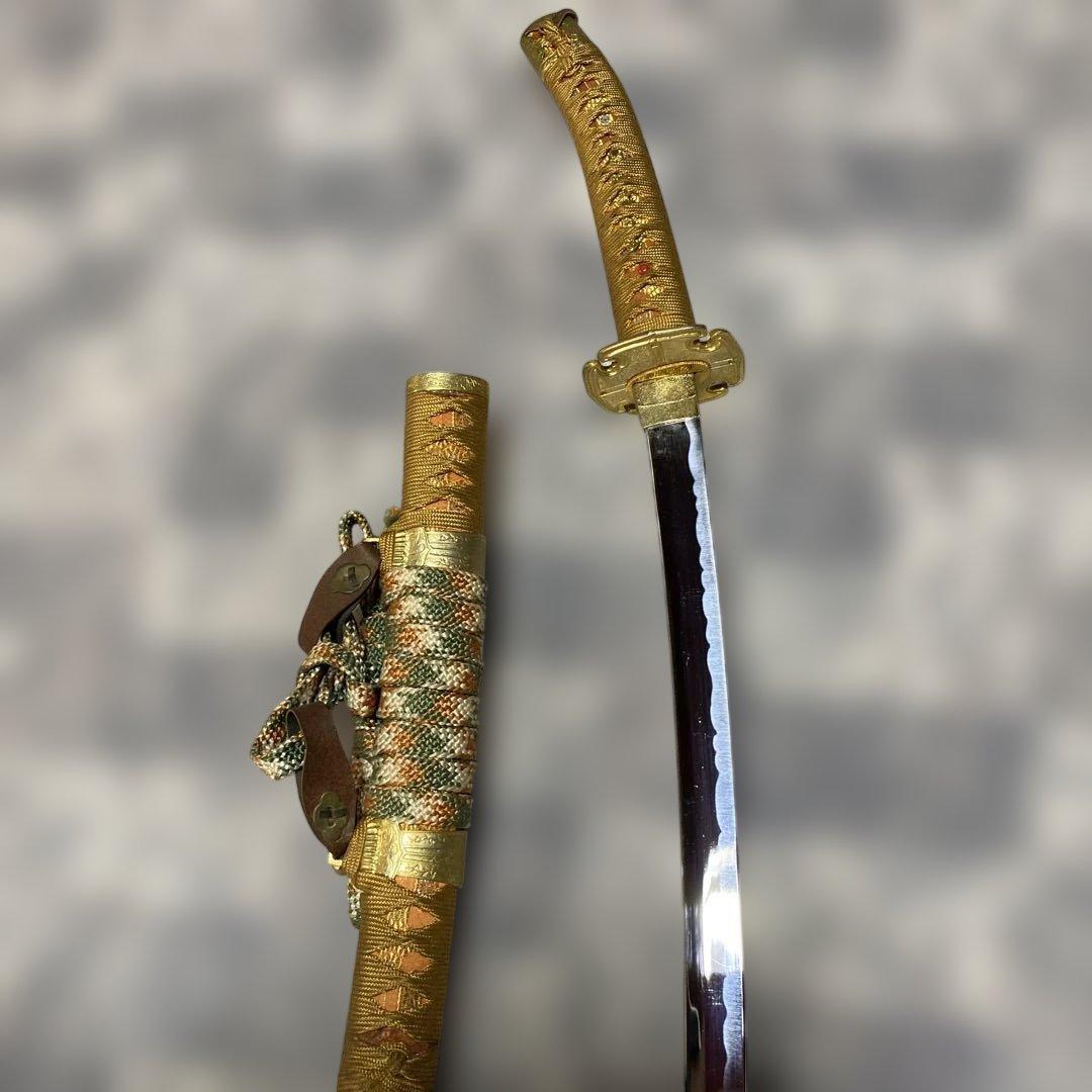 模造刀 太刀 金茶柄 太刀型金鍔 金口金尻梨地呂鞘 - メルカリ