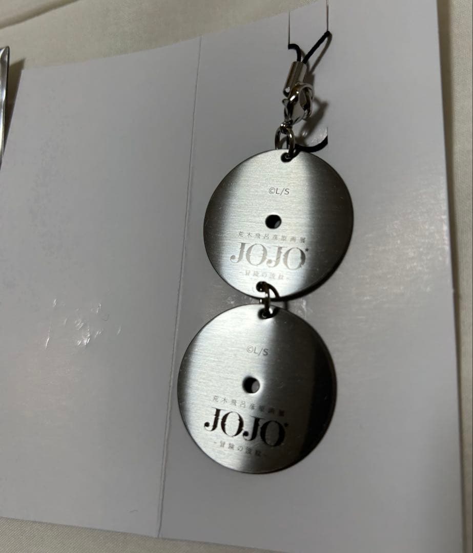 ジョジョ展 メタルDISC型 キーホルダー 限定品 荒木飛呂彦 原画展 空条