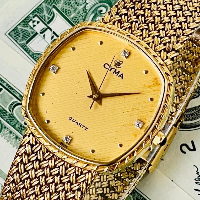 腕時計メンズ不動シーマCYMAクォーツ金ゴールド文字盤スイス製ジャンク