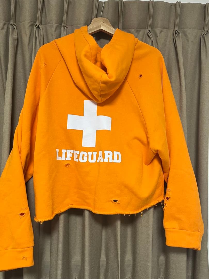 トップス LIBERAL YOUTH MINISTAY