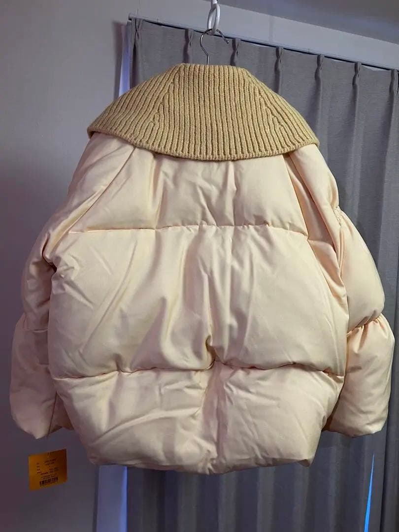 新品】PINUE ボリュームスリーブダウン カスタード - メルカリ