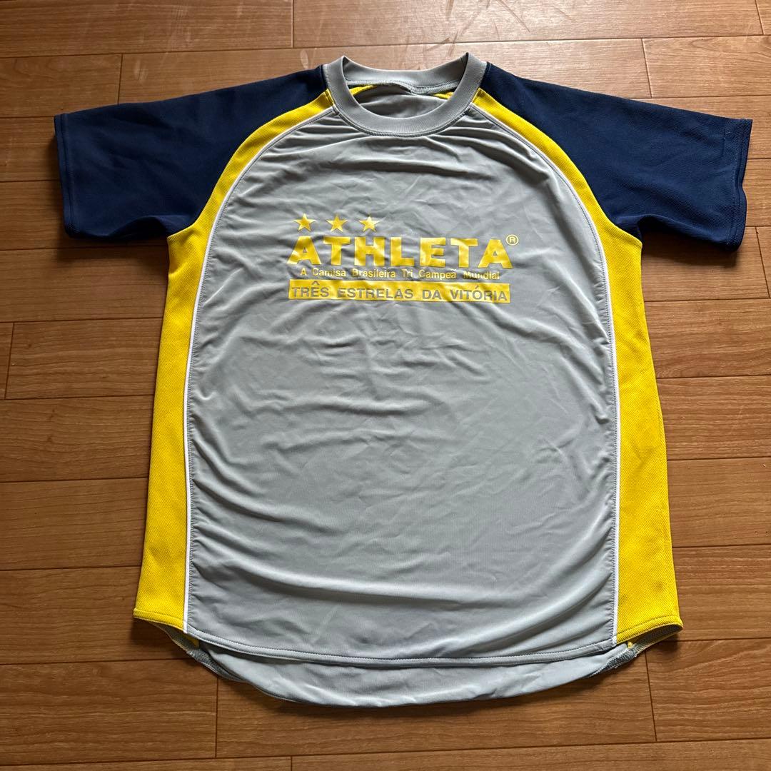 ATHLETA シャツ グレー/ネイビー/イエロー ATHLETA アスレタ カフェブラピステシャツ(ネイビー) 02425 NVY