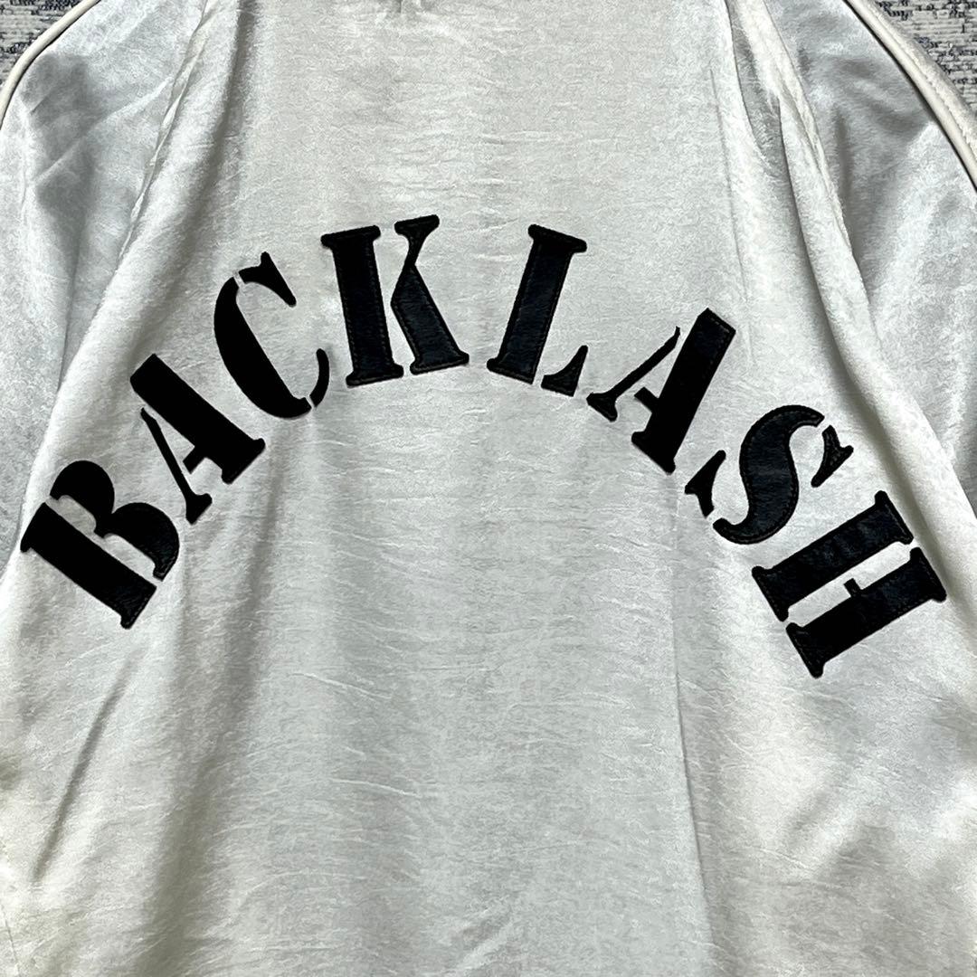 バックラッシュ 名作！ スカルxロゴのリバーシブルスカジャン L