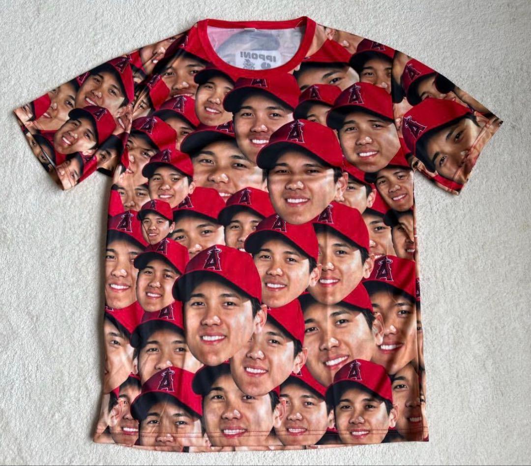 大谷翔平 エンゼルス 顔だらけ Tシャツ 新品未使用 限定配布希少品 新品]大谷翔平 選手 顔 だらけ Tシャツ 米国直輸入 本物 新品未使用 XL