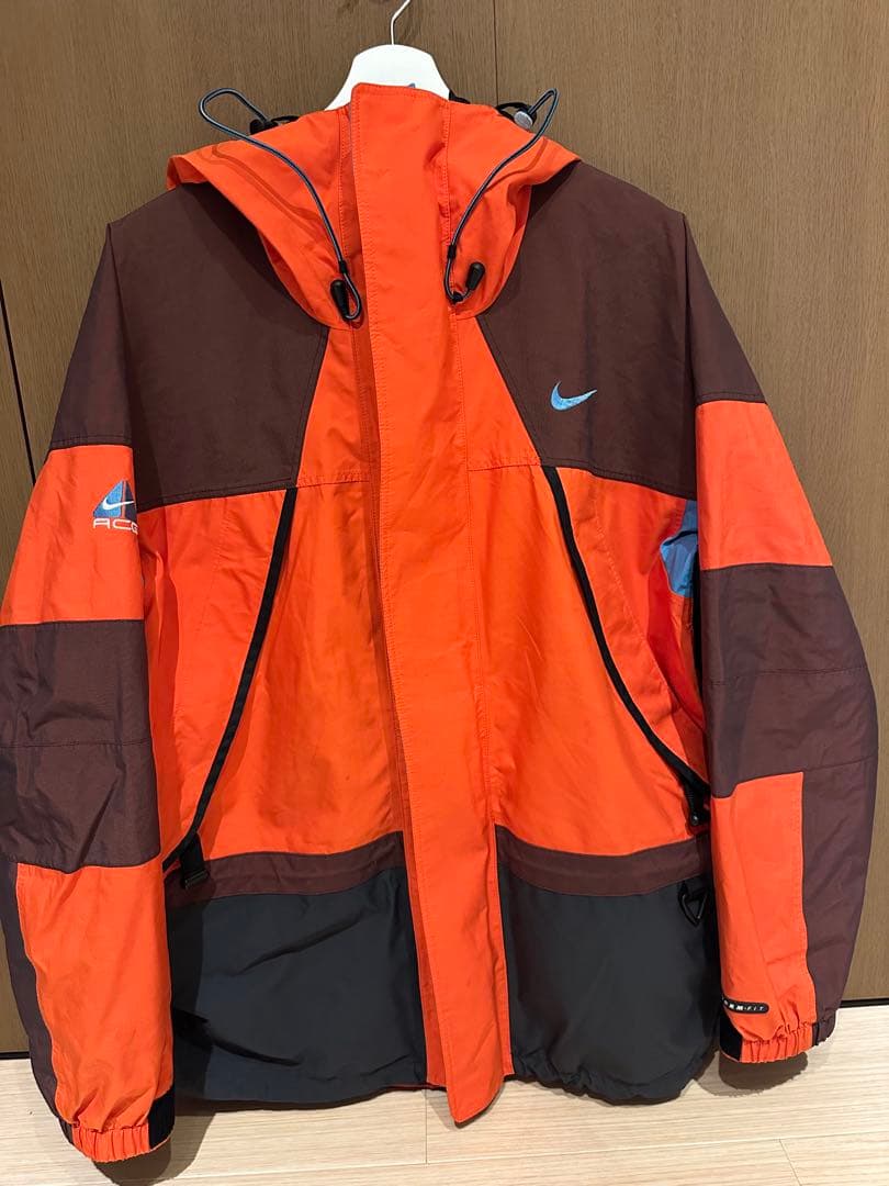 l*n様 Nike ACGマウンテンパーカー オレンジ/ブラウン/ブルー NIKE ACG◇マウンテンパーカ/Storm Fit Jacket/マウンテンジャケット/M