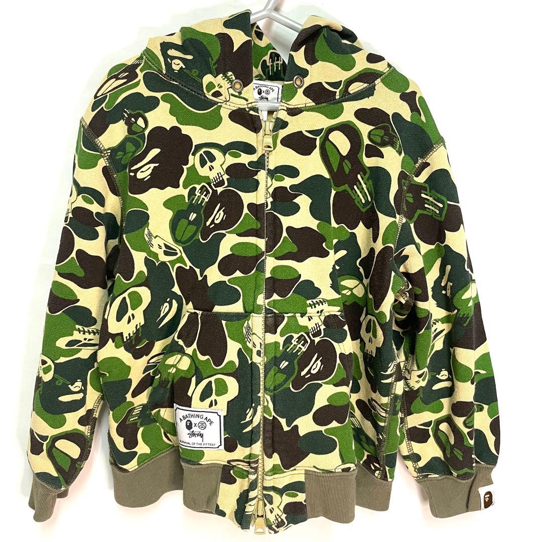 APE × STUSSY コラボ カモフラ カーキ ジップ パーカー - メルカリ