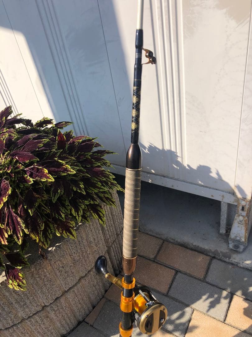 カーボンファイバー スピニングロッド 2.1m 黒オレンジ