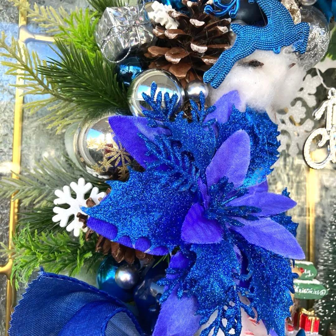 キリン様専用です。ロイヤルブルーポインセチアとローズのクリスマス