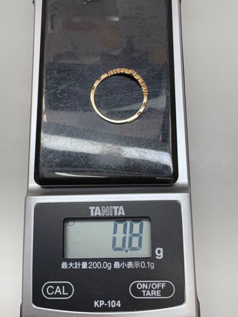 アガット・k10ゴールド 波型 ダイヤリング・13号・0.8g・中古品