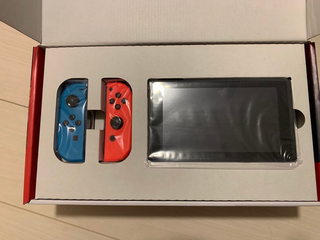 新品 未使用Nintendo Switch 本体 青/オレンジ - メルカリ